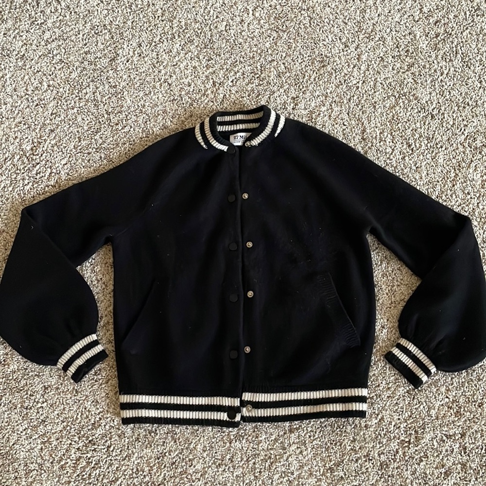 Black cardigan with off white trim. In great condition, super soft.